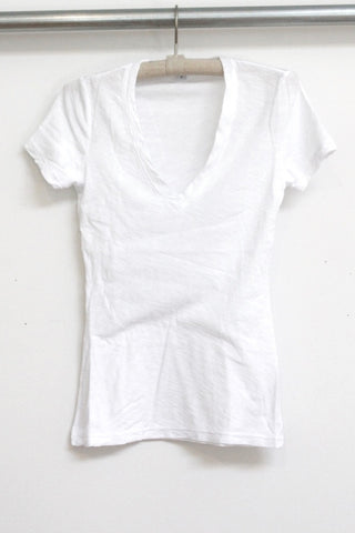 tee with reverse binding