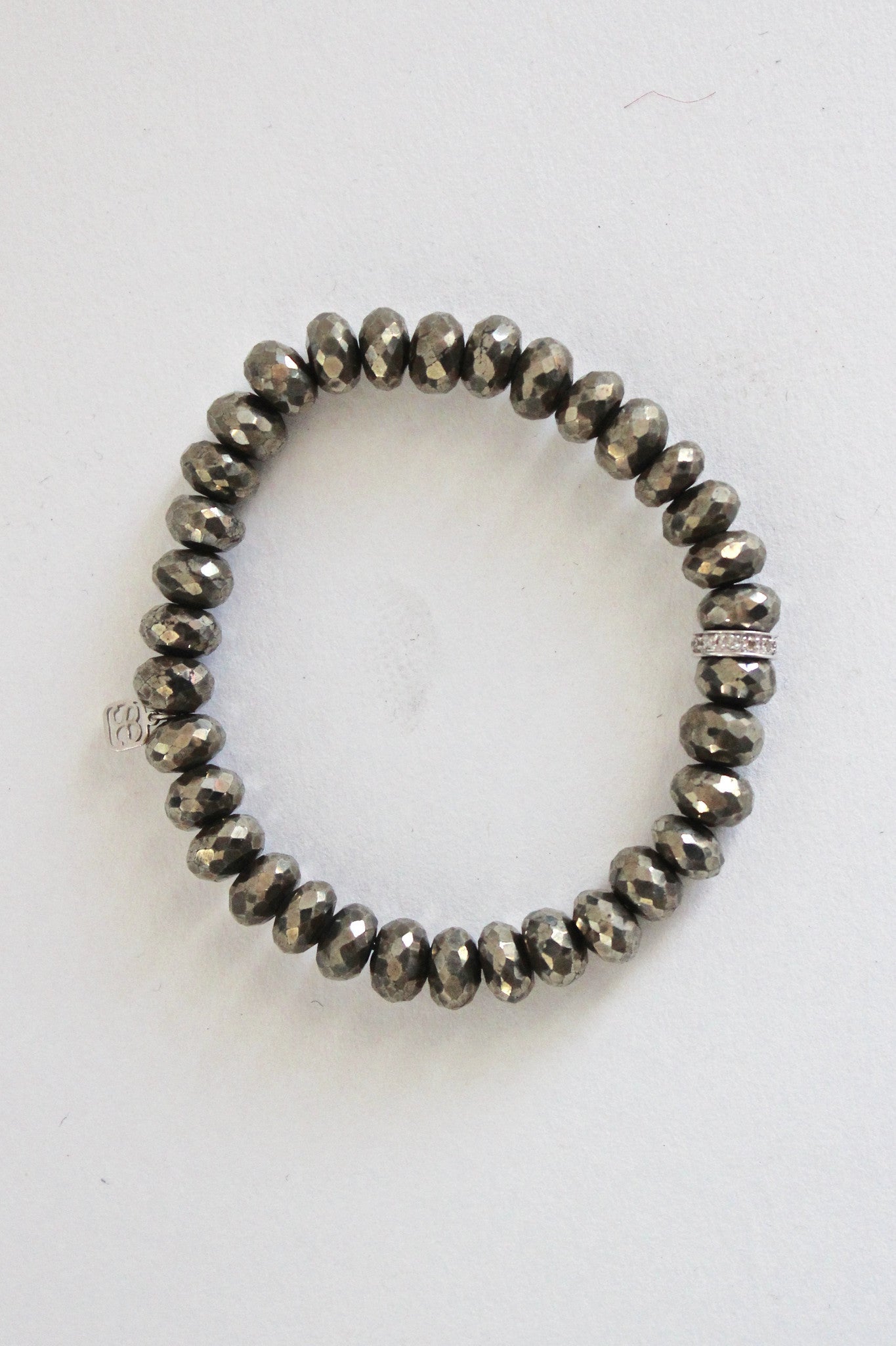 pyrite bracelet with pave diamond bead
