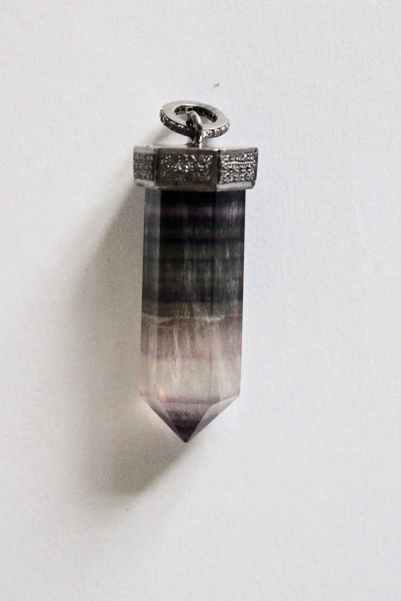amethyst crystal pendant capped with pave diamonds