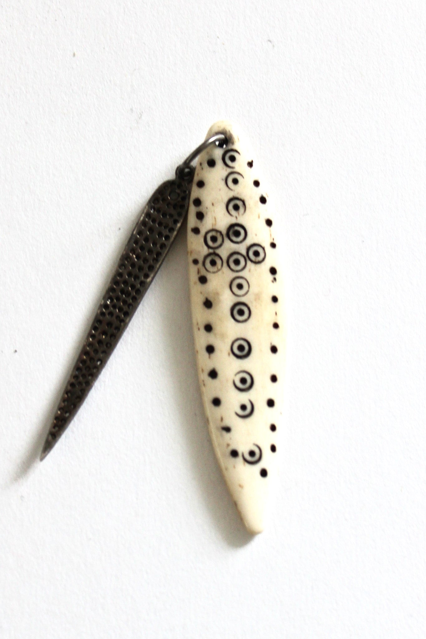 carved african spear pendant