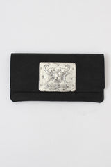 vegetable-tanned leather clutch