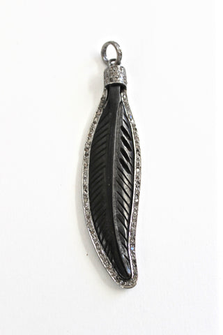 feather yak bone pendant framed with diamond