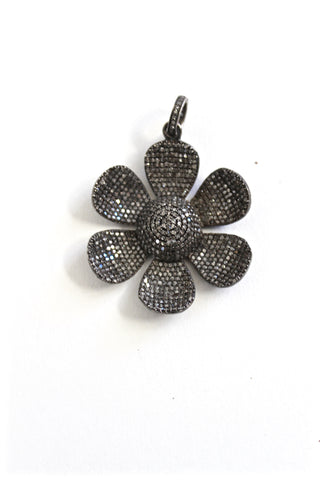 diamond encrusted flower pendant