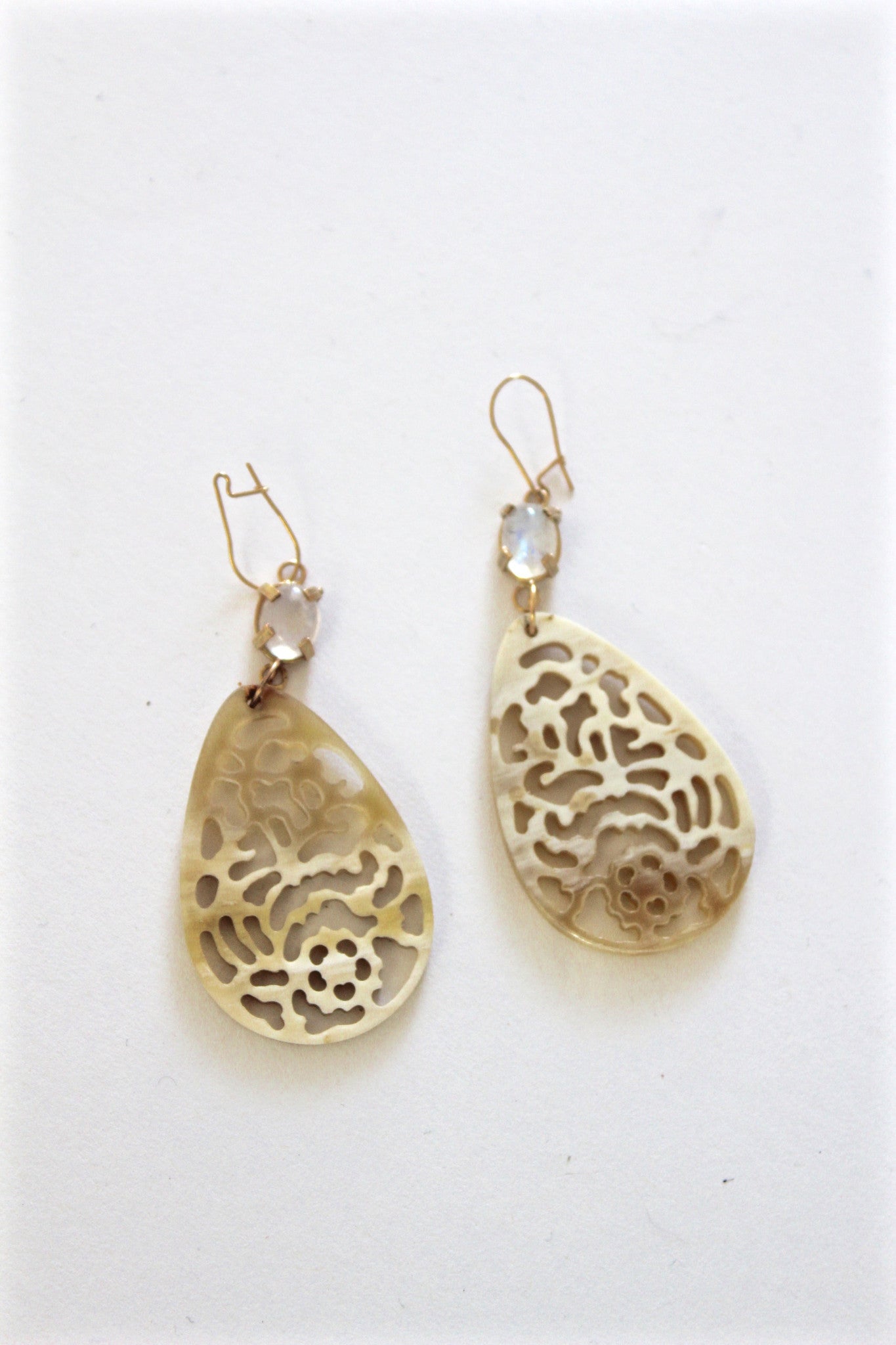 horn pendant earrings with rainbow moonstones set in gold