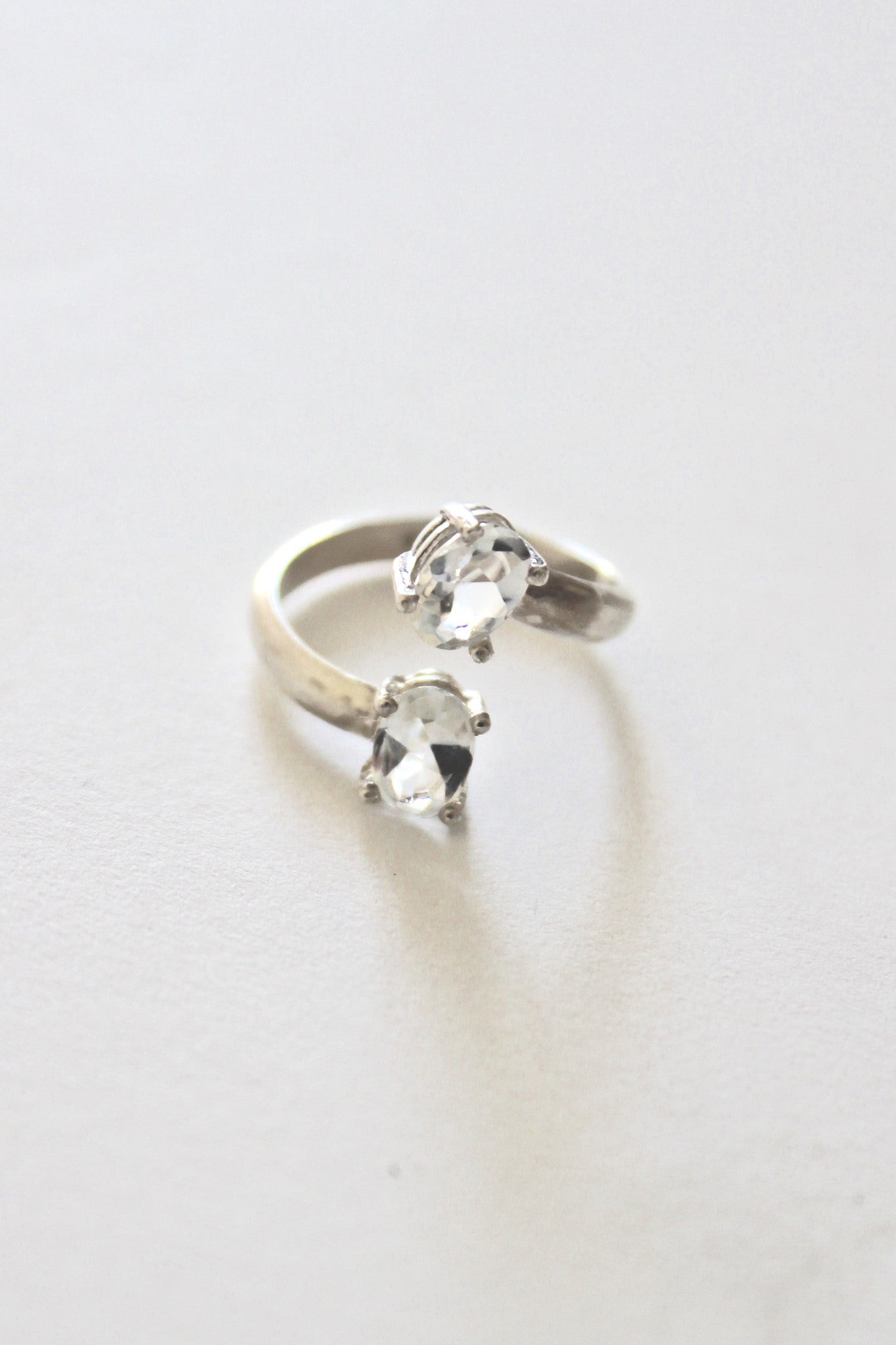 sterling silver open ring with white topaz stones