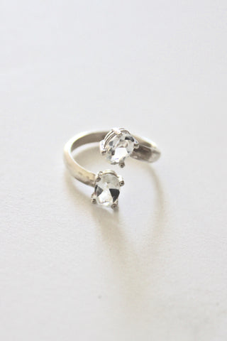 sterling silver open ring with white topaz stones